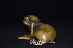 4Chinese antiques Yellow copper Kneeling position Statue of a lion looking back