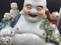 A Large Chinese Famille Rose Porcelain Sitting Buddha Boys You Longsheng