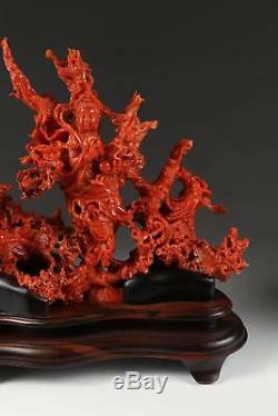 A Stunting Chinese Coral Carved Figural Group Guanyin, Dragons, Waves, Clouds