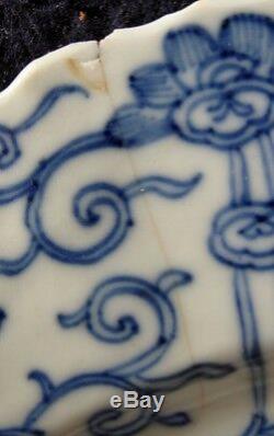 A nice Chinese porcelain Kangxi period dish with hunstman on horseback tulips