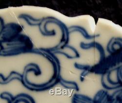 A nice Chinese porcelain Kangxi period dish with hunstman on horseback tulips