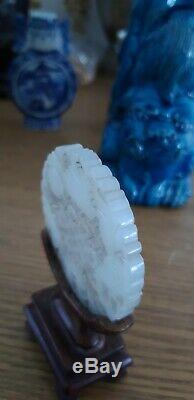 Antique Chinese pale celadon Jade circular plaque. Pendant on stand