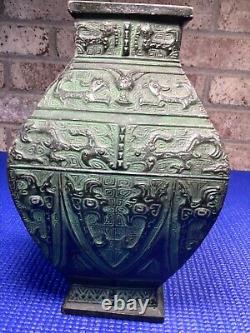 Antique cast iron Chinese vase dynasty mark on bottom