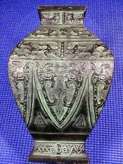 Antique cast iron Chinese vase dynasty mark on bottom