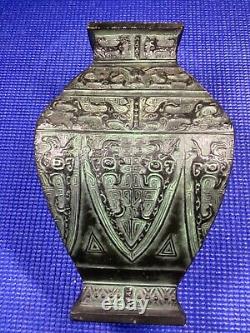 Antique cast iron Chinese vase dynasty mark on bottom