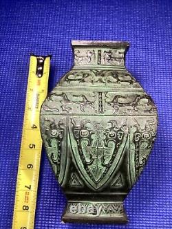 Antique cast iron Chinese vase dynasty mark on bottom