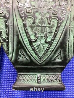 Antique cast iron Chinese vase dynasty mark on bottom