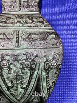 Antique cast iron Chinese vase dynasty mark on bottom