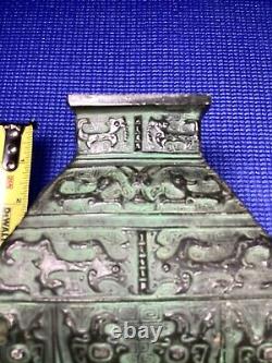 Antique cast iron Chinese vase dynasty mark on bottom