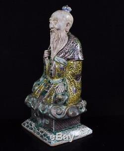 Chinese Kangxi Biscuit Glazed Famille Verte Seated Dignitary Figure
