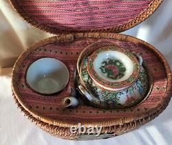 Chinese Rose Medallion teapot +cup in travelling basket. Original label, 1920's