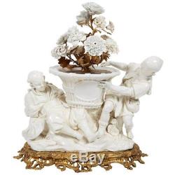French Chinoiserie Ormolu Bronze & Blanc De Chine Porcelain Group of Chinese Boy