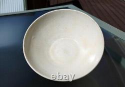 Two Chinese Yuan Qingbai Bowls one with molded lotus decoration 13th C